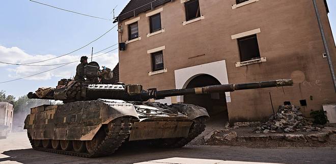 Как украинские бойцы на учениях НАТО оборонялись в городе: видео 