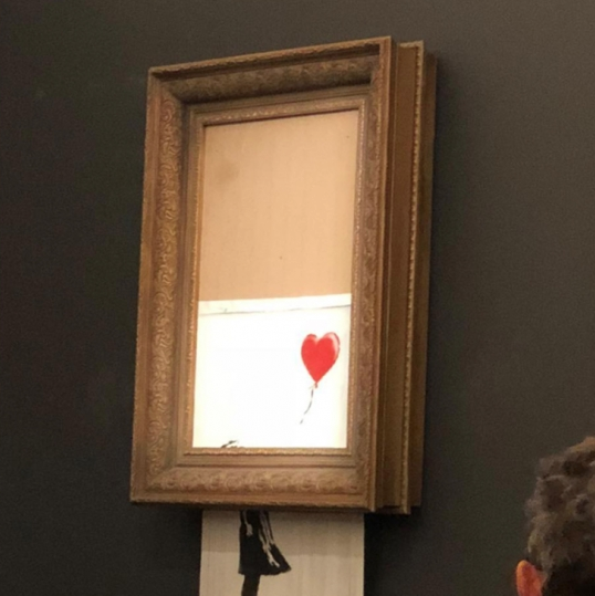 Картина Бэнкси самоуничтожилась после продажи за $1,3 млн: фото