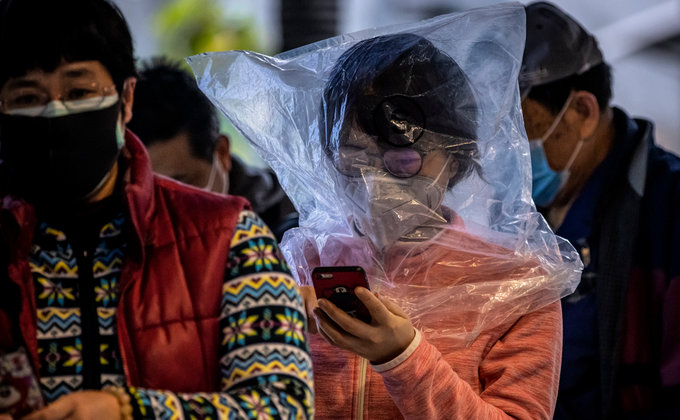Закутанные в кульки. Как в Китае защищаются от коронавируса: фото