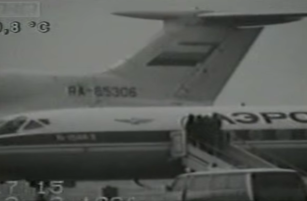 Задержание Чичкина в самолете (фото - скриншот видео)