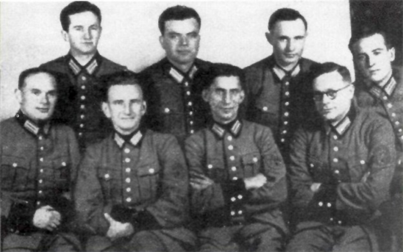 Роман Шухевич сидит второй слева вместе с руководителями батальона (Фото – Twitter Joel Lion) Израиль требует отменить переименование стадиона в Тернополе в честь Шухевича